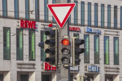 Traffic lights switched to red and traffic sign giving way, Germany, Europe