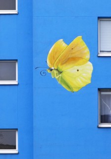 Sunflower house, painted yellow lemon butterfly on a skyscraper, artist Ulrich Allgaier, Wuppertal,