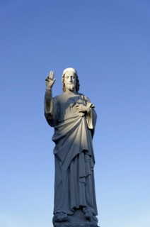 Church of Notre-Dame de la Garde, Marseille, statue of Jesus with blessing gesture under a deep