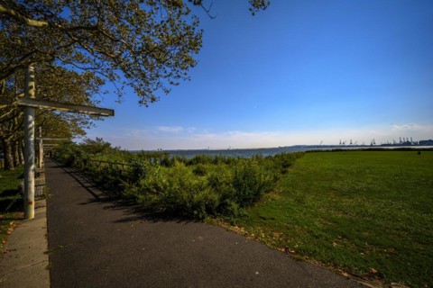 Views on New York Harbor, Manhattan and Statue of Liberty from the Liberty State Park, Jersey City,