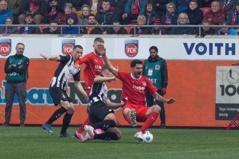 Football match, Robin HACK Borussia Moenchengladbach centre left fouls Tim KLEINDIENST 1.FC