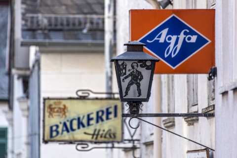 Cantilever sign, AGFA Film und Foto advertising sign, light box, abandoned photo shop, street lamp,