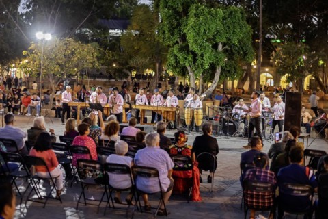Oaxaca, Mexico, The Marimba del Estado band entertains a crowd in the zocalo. Marimba band music is