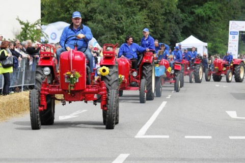 Porsche Diesel tractors, in a parade, driven by people in blue overalls, SOLITUDE REVIVAL 2011,
