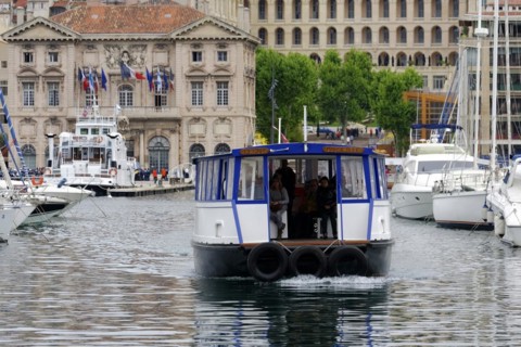 Marseille harbour, A small ferry with passengers crosses the harbour water, Marseille, Departement