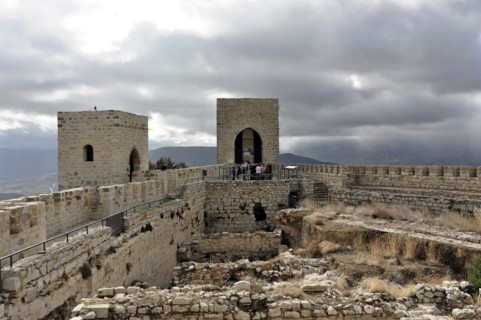 Castillo de Santa Catalina on Jaen, Historic fortress with towers and visitors on the ruins with