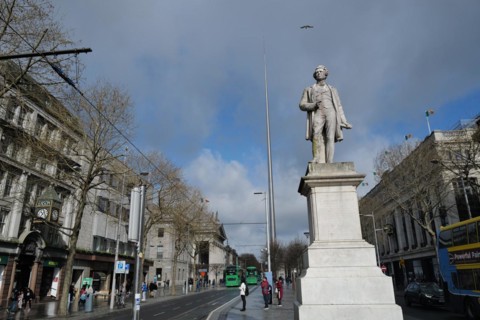 The Sir John Gray monument in O'Connell Street with the Spire in the background. Dublin, Ireland,