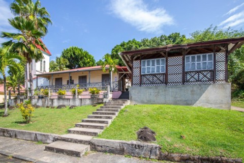 Deshaies, historic Caribbean wooden building of a street in Guadeloupe, Caribbean, French Antilles