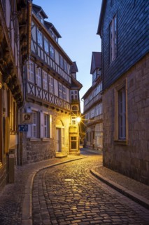 Narrow alley with half-timbered houses and cobblestones at Finkenherd in the historic old town at