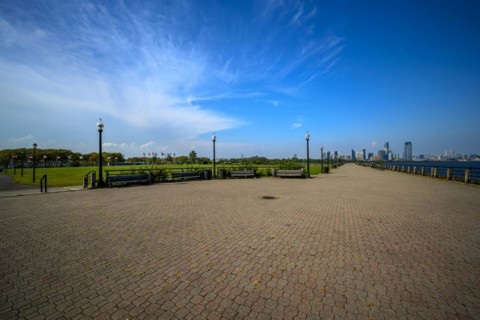 Views on New York Harbor, Manhattan and Statue of Liberty from the Liberty State Park, Jersey City,