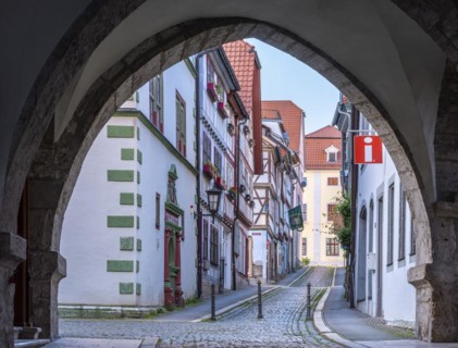 Archway at the town hall in the historic old town, alley with cobblestones, Muehlhausen, Thuringia,