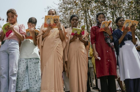 Christian devotees takes part in a perform to re-enactment of the crucifixion of Jesus Christ