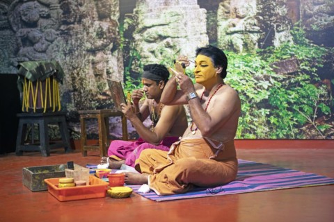Kathakali performers or mime artists, 38 and 60 years old, make up their faces, Kochi Kathakali