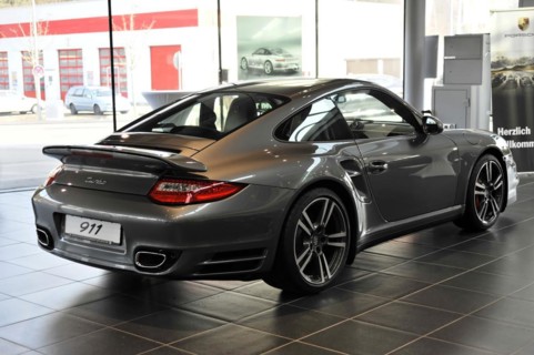 Side view of a grey Porsche 911 Coupe in a car dealership, Schwaebisch Gmuend, Baden-Wuerttemberg,