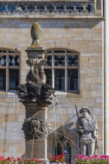 The wooden market fountain at the town hall with the Roland statue, Halberstadt, Saxony-Anhalt,