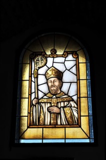 Castillo de Santa Catalina in Jaen, An artistic stained glass window with the portrait of a saint,