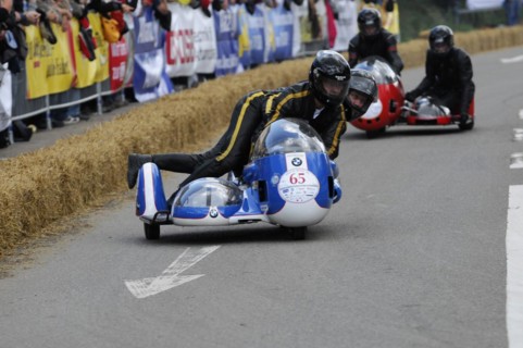 Racer on a motorbike with sidecar in racing action, SOLITUDE REVIVAL 2011, Stuttgart,