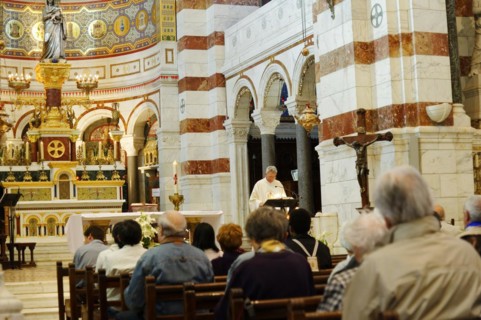 Church of Notre-Dame de la Garde, Marseille, worshippers during a service in a church, Marseille,