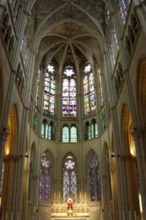 Church of Saint-Vincent-de-Paul, interior view of a church choir with Gothic stained glass windows
