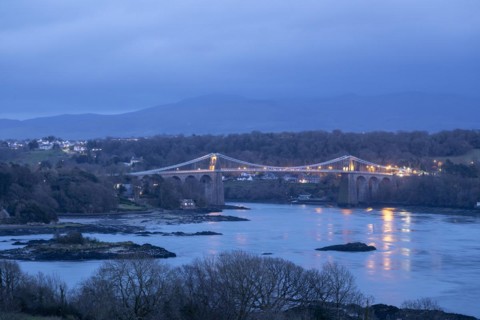 Menai Suspension Bridge in the evening, Menai Strait, LLanfair Pwllgwyngyll, Isle of Anglesey,