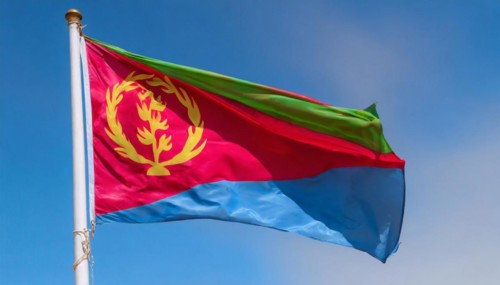 Flags, the national flag of Eritrea flutters in the wind