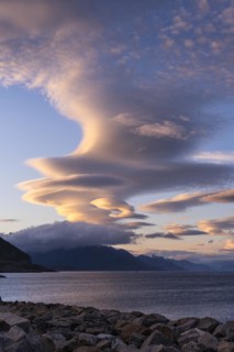 Cloudscape, view from Hamnoy over the sea along Moskenesoya, Flakstadoya and Vestvagoya. Several