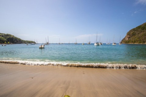 A beach in the Caribbean on the Atlantic coast in Deshaies, Guadeloupe, French Antilles, North