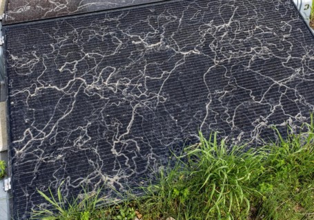 Sahara dust on a solar module, solar panel, a balcony system on a green roof, Braunschweig, Lower