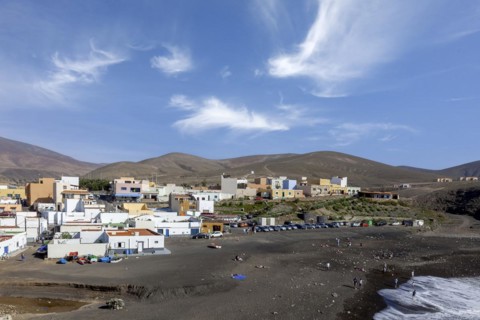 View of the fishing village Puerto de La Pena with the beach Playa de los Muertos, Ajuy, west