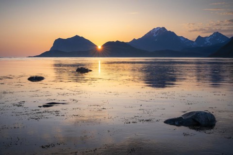 Landscape on the Lofoten Islands. View from Flakstadoya to Vestvagoya with the snow-covered