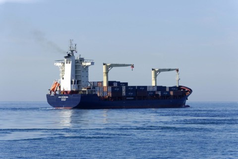 OPS HAMBURG, A large container ship sails on the sea against the blue sky, Marseille, Departement
