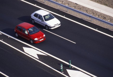 Traffic on the highway in Malaga region, Andalusia, Spain, Southern Europe. From above. Scanned