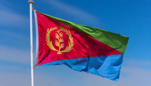 Flags, the national flag of Eritrea flutters in the wind