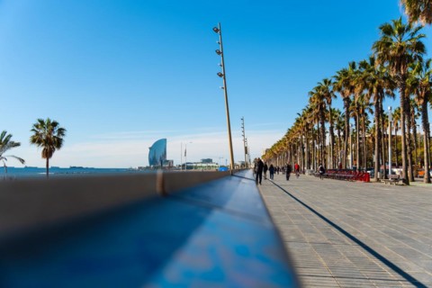 Promenade with joggers on the beach in Barcelona, Spain, Europe