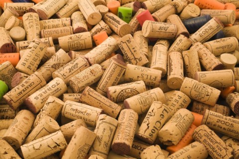Pile of assorted natural oak and plastic wine bottle corks and stoppers of various vintage, Studio
