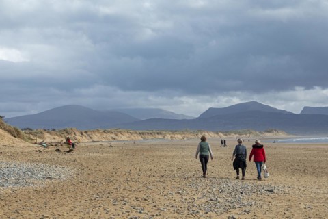 Beach, people, clouds, mountains, LLanddwyn Bay, Newborough, Isle of Anglesey, Wales, Great Britain