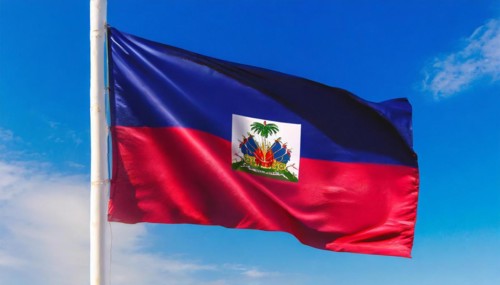 Flags, the national flag of Haiti flutters in the wind