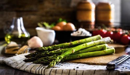 Green asparagus in a rustic farmhouse kitchen, AI generated, AI generated