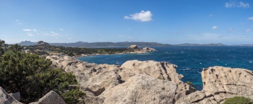 Typical granite rock formations in front of a bay, Baja Sardinia, Costa Smeralda, Sardinia, Italy,