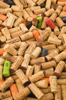 Pile of assorted natural oak and plastic wine bottle corks and stoppers of various vintage, Studio