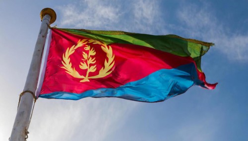 Flags, the national flag of Eritrea flutters in the wind