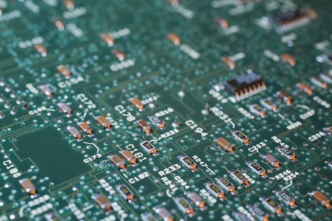 Close-up of green lighted electronic computer circuit board, Studio Composition, Quebec, Canada,