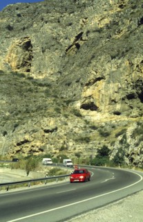 Traffic in Sierra Nevada, Grenada region, Andalusia, Spain, South Europe. Scanned thumbnail slide,