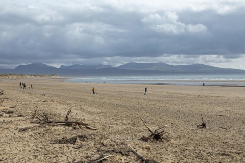 Beach, people, clouds, mountains, LLanddwyn Bay, Newborough, Isle of Anglesey, Wales, Great Britain