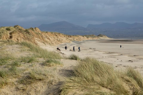 Beach, people, clouds, mountains, LLanddwyn Bay, Newborough, Isle of Anglesey, Wales, Great Britain
