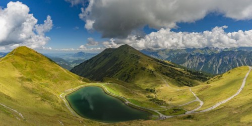 Riezler Alpsee, an artificial lake, snow pond, feeds the snow cannons that provide complete snow