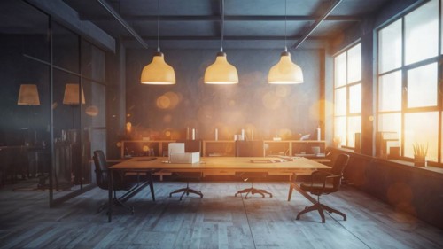 Modern office interior featuring a wooden table, artistic pendant lighting, and warm atmosphere,