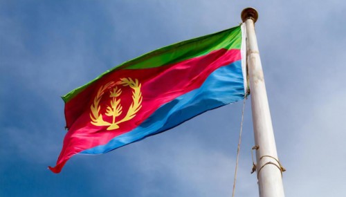 Flags, the national flag of Eritrea flutters in the wind