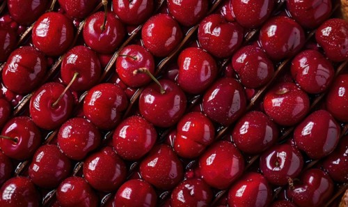 Ripe cherries arranged in an intricate pattern, rip cherries background AI generated