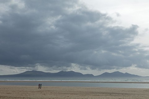 Beach, people, clouds, mountains, LLanddwyn Bay, Newborough, Isle of Anglesey, Wales, Great Britain